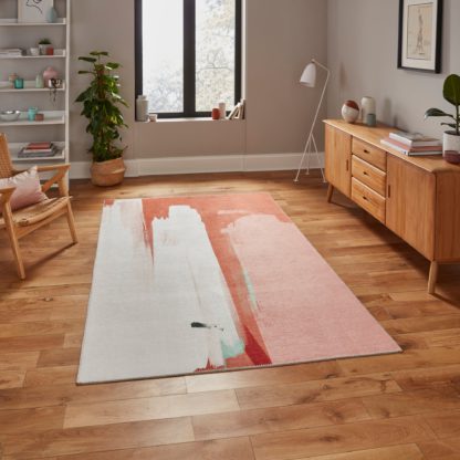 4bb4bd6a98954cb34d48632349004c3b8005c23450eceb3c7e212dc1a20d0aaf.jpg An Image of Michelle Collins Abstract Rose Crimson Rug Rose (Pink)