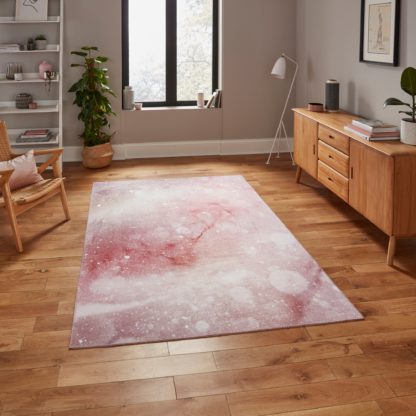 4c89875af20eae35032b57d4650d9609e29abc3494df0e2508e3d809f14098b9.jpg An Image of Michelle Collins Abstract Rose Crimson Rug Rose (Pink)