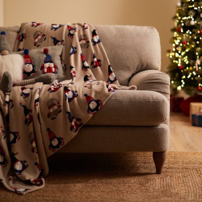 7c27ba23ea063d28680c1d6c9e22acf8150622f3f92574f3a373611751fe415c.jpg An Image of Nordic Nomad Gnome Fleece Blanket MultiColoured