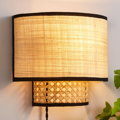 8a831ae76629321f142e7d427c8e7704bb92079481a5af630f10a355cc755714.jpg An Image of Malika Cane Easy Fit Plug In Wall Light Natural
