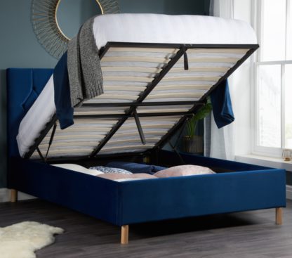 96a9438bf7216a0305d0c21d032f5759e2ab80734c02b1b807d567ea69c11590-1.jpg An Image of Loxley Blue Velvet Fabric Ottoman Storage Bed Frame - 4ft6 Double