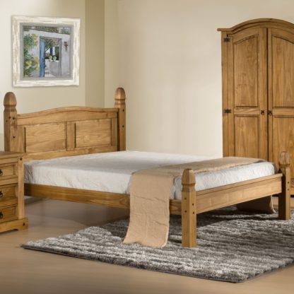 bf6c4a98d7d954f093b9f4f209973501b432cd2b621302d86c148fd6dd2e20cd.jpg An Image of Solid Pine Wooden Bed Frame 4ft Small Double Corona Low Foot End Waxed