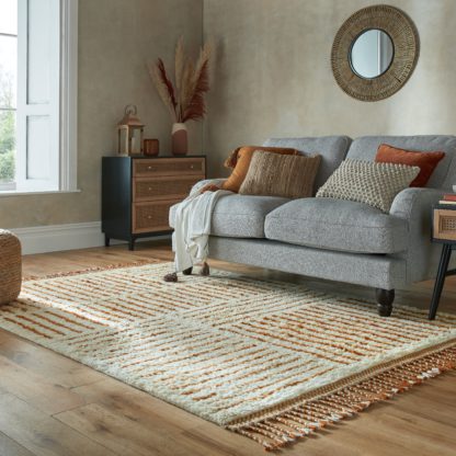 c24bdea866c628db0aaa4b7167b41b6660e4ca2e65b6f3f0385c5d315932a65a.jpg An Image of Deniz Wool Berber Rug Deniz Butterscotch
