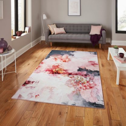 f1bdbeb2cd9f052342da1a7c64c7ed0ac68d0c39d250b0fdcf728116249d4f88.jpg An Image of Michelle Collins Abstract Rose Crimson Rug Rose (Pink)