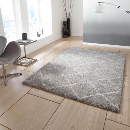 051b16c20c9bd4d5a527c6305a0501b4023e97a0852f48fb080f54520abd1d86-2.jpg An Image of Royal Nomadic 5413 Rug Pink and White