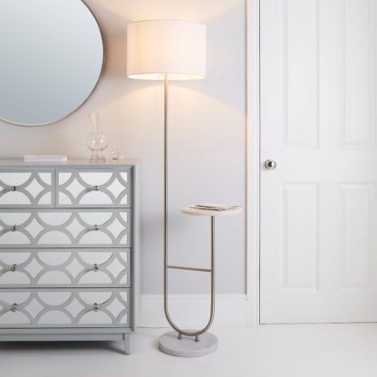 25ad2975bb01d308d7518bf576527dbef6f9259bb5faacf78a2ea6e0ce5737ad.jpg An Image of Carrara Marble Base Floor Lamp with Table Marble