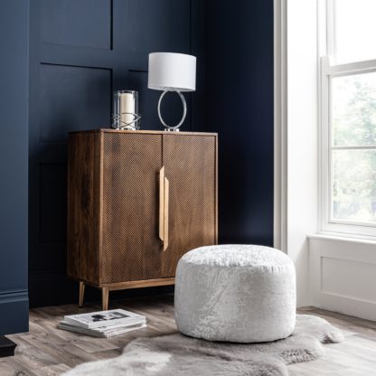 4123286fabffd90cc6aa9fe22e6c52ac24a32ace5c1b07772e0bc637dd832787.jpg An Image of Starlet Pouffe Beige