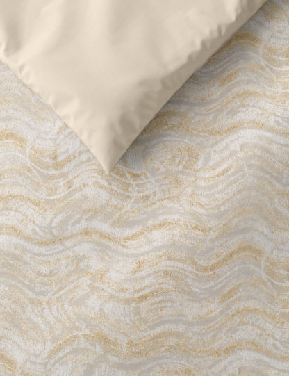 56c578e2d308e3fda4b93a933a39a5d1e14e4b94f6b9ff14ae82783fad539798-2.jpg An Image of M&S Marble Metallic Jacquard Bedding Set
