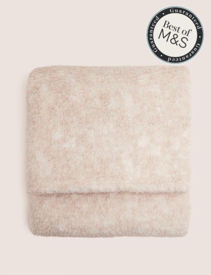 5b975f0d44f7c6a5bf28786d01a2f707c366353d87d83e7a994221f4a6082651.jpg An Image of M&S Teddy Fleece Throw