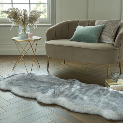 8bc56ea597f348d42bac9f639669000f0ec5557c70629846eb5a933982292ec2.jpg An Image of Copenhagen Double Pelt Faux Fur Rug Copenhagen Blush Pink
