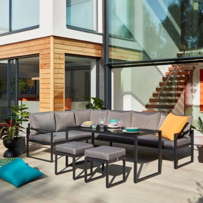 8fbb331899c70d5d9d358b4521332a9f94889e34eaf8415343a0d4314bbabc9a.jpg An Image of Elements 7 Seater Corner Sofa and Dining Set Black