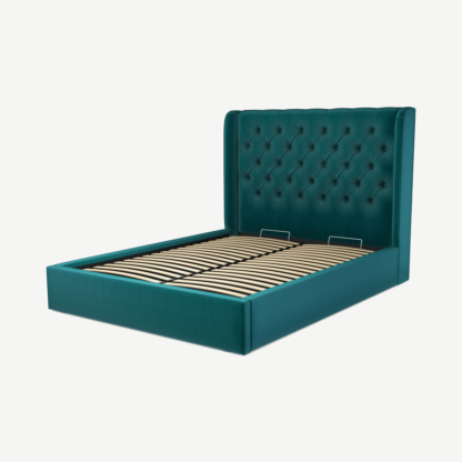 a0f58212639da525ab2ab26e01436dfb794741c5c76f2149f7b4a8a27b5e32fb.png An Image of Romare King Size Ottoman Storage Bed, Tuscan Teal Velvet