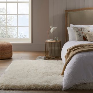 An Image of Luxe Faux Sheepskin Rug Luxe Ivory