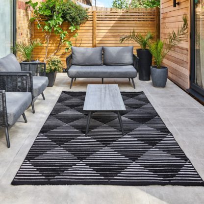 a4df74a533a1ad4e2f879e6502182ba7dfeb9f1efa285f1221de0de9a9068eaf.jpg An Image of Jazz Geometric Indoor Outdoor Rug Jazz Blue