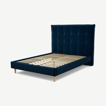 ad2c2657bfa5e5636d72ad2f196bd1cfa7c592b70b69b423a20d63cb3acc8335.png An Image of Lamas Double Bed, Regal Blue Velvet with Oak Legs