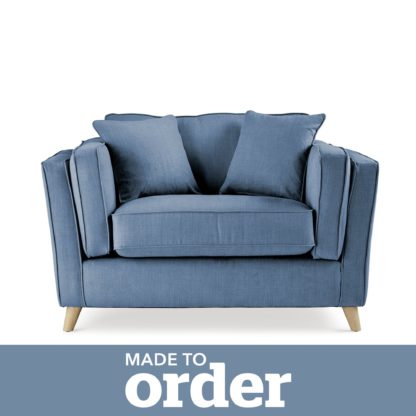 f2416122b34d50ff8de9911346789e3c377097a07d40f687584ebfd1d6aa9979.jpg An Image of Arabella Snuggle Chair Brushed Plain Fabric Blue