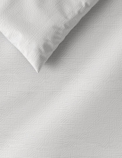 1b7d1648a092608fb00979a73193ee98b7c098ddc9643e12a4535ef252a13349.jpg An Image of M&S Pure Cotton Geometric Matelasse Bedding Set