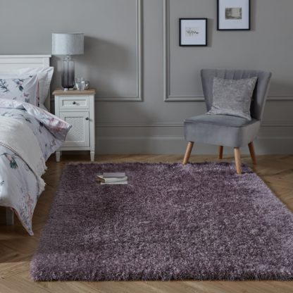 2df9aca074ca7e560c6f151218d755a9fac671f5fc5100b7f4110c26d860eebe.jpg An Image of Riviera Sparkle Shaggy Rug Riviera Mauve