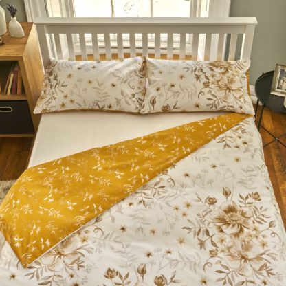 90663f66a4153a1e01d9df070f2c21e2fb95baf306d6e2e4fd3dbc8125fc0f9d.jpg An Image of The Willow Manor Easy Care Percale Single Duvet Set Peony Posy - Ochre & Natural