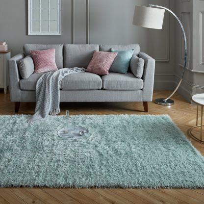 980f6beeee0e65c61e985299fd6b7c9d06da39eb6c132bdc7911104083cedbb6.jpg An Image of Riviera Sparkle Shaggy Rug Riviera Mauve