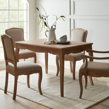 9dfb1d95a90d3f771652e6a6f53995f6642cf4504ddf5a5801a7c39c1c0c658a.jpg An Image of Giselle Dining Table Natural