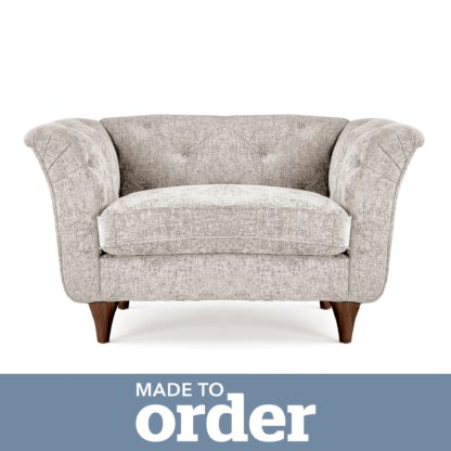 a284913fe2e41bf0ce17fa42f93e6da420df7bb6474d4c1cb1c2dabb08b5861f.jpg An Image of Jaipur Snuggle Chair Luxury Chenille Pink