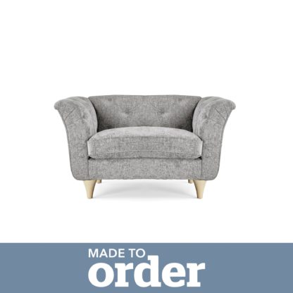 b845803f96d2480532ba3a96d65a0ef20a675e534bd1632ee98c551a75ca4723.jpg An Image of Jaipur Snuggle Chair Luxury Chenille Pink