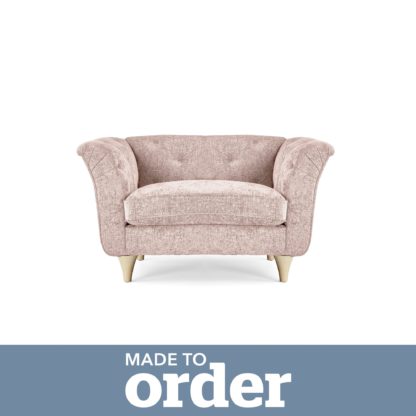 dfeb8785331f8c06054260957873005cc6492dea1fefe1662fe8b9048bcd72c5.jpg An Image of Jaipur Snuggle Chair Luxury Chenille Pink