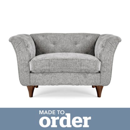 ef6d2e6d69f41368da2a6352957884e206597124b43eff1a73e9927164c4fc4d.jpg An Image of Jaipur Snuggle Chair Luxury Chenille Pink