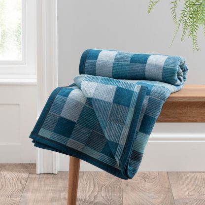 6d6762df22b5aa63389b1cc2637caf38649c3d869e18b5fc2e640a5fa5eb1dc7.jpg An Image of Super Soft Mini Squares Throw Blue