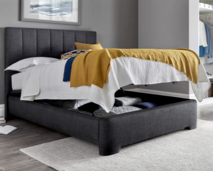 a921924f87f8365f5951610b80a328e6edbaf23ef97269b593410da0a1d3c959.jpg An Image of Medburn Slate Grey Fabric Ottoman Storage Bed Frame - 4ft6 Double
