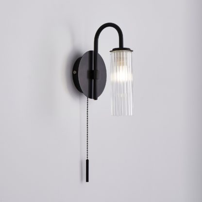0c84d6b598ff7c5a1c395ba50deff838574a5d706f14676f90cfa751ce9f790c.jpg An Image of Dorma Henstone Black Wall Light Black