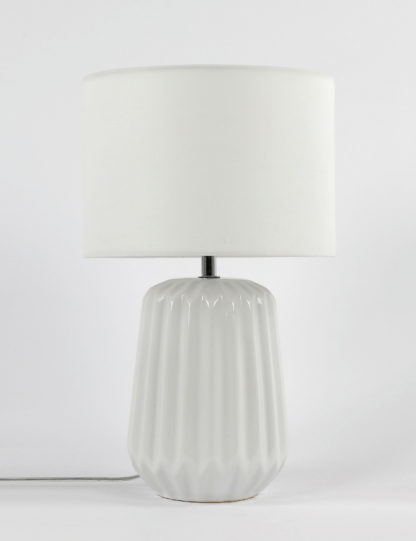 2fb71f3e9a7f8448d202d699802719572953bac589f99ae0f278d92780be9dbe.jpg An Image of M&S Ceramic Geometric Table Lamp