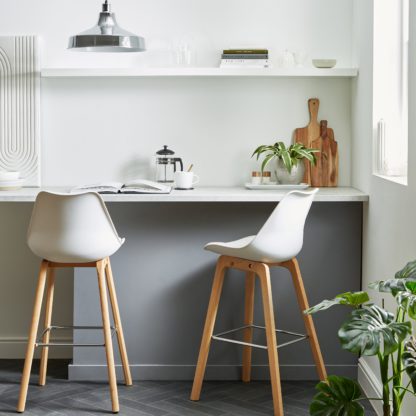 4e75a7cfff06a858fa28f6da05b9706fb1cc1227a482d4c7929108d8a083a65b.jpg An Image of Erik Bar Stool with White Back White