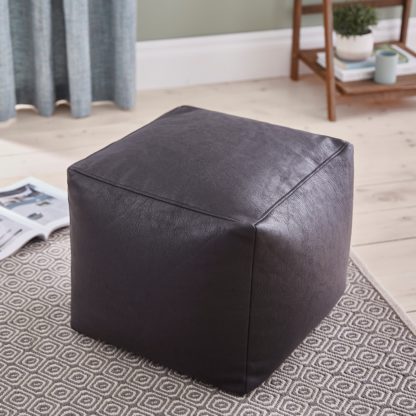 af2f6309f9e1427b9a6e034539beb45ec0c5ba9a100c2f743e6eacfaa678b8b7.jpg An Image of Faux Leather Cube Pouffe Black