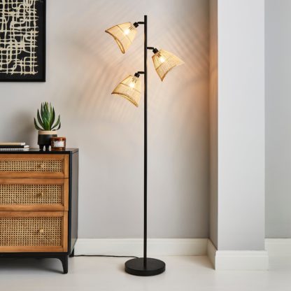 b91e73d1866046bef99e29ad336b73957231b53a3bbfbe1322d1b06f371dc462.jpg An Image of Elements Jaula 3 Light Rattan Floor Lamp Natural