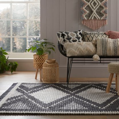 e3ec97f8c0deb6fd84a0a915b7d30b1cd7b2cd61b840d00060a75f7991600cf0.jpg An Image of Zaid Berber Rug Black and white