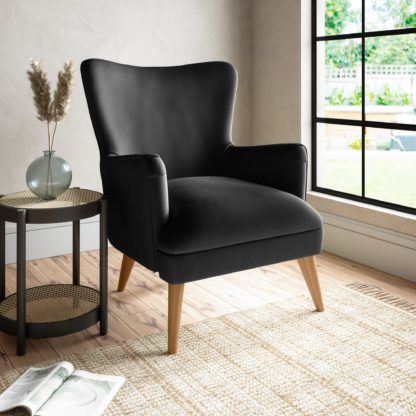 a3f0587221b732456b07d48efea18199de5295182f384835cec3c3fe725347b4.jpg An Image of Marlow Luxury Velvet Armchair Luxury Velvet Black