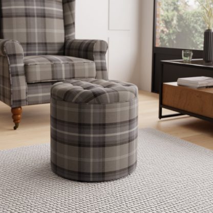 376ffc4ba263442e3a28f8538ffae3fbf71876df151a41b144b973615dfbbbd1.jpg An Image of Oswald Check Round Buttoned Storage Footstool Natural Oswald Wingback