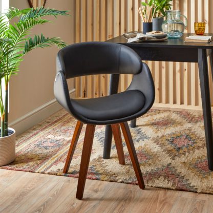7641a47c3b547c614cc14cfc484cd6a829371a12b32e5cdb6a46efa219f0db4c.jpg An Image of Torcello Dining Chair Black