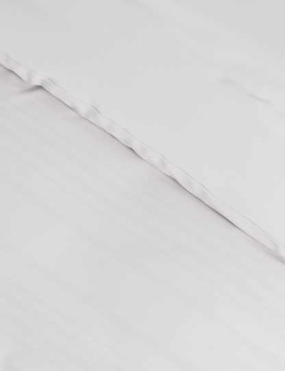 fa51490bd4120663d34f428a46f7385fc37a97ea094a8708d32ff29c5a23353b-1.jpg An Image of M&S Cotton Blend Waffle Stripe Bedding Set