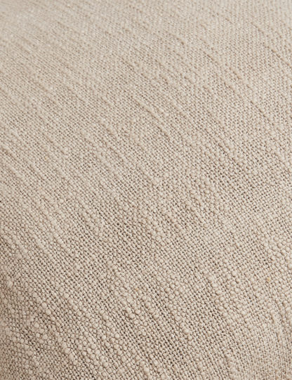 16ac34d7f5833ddb1334ab50bfbc24dd6e09b3ea2f174dda49db26f9890bdb99.jpg An Image of M&S Pure Cotton Pom Pom Edge Cushion