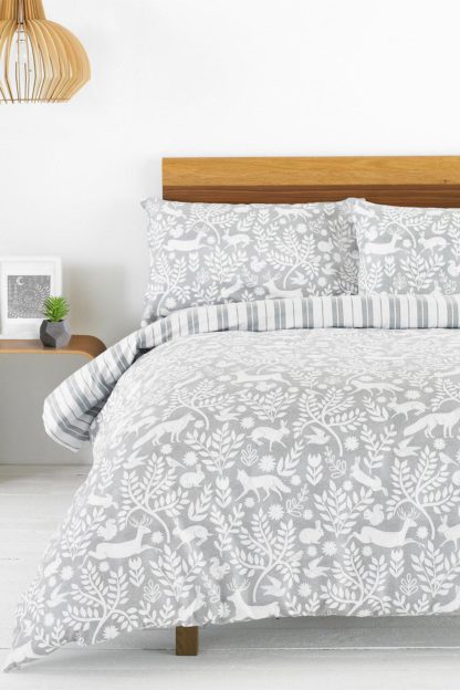 2c04fc0ff7edad9e9e746f82c45fb4cebec574a2f974e6f587001e543bec7f1c.jpg An Image of 'Skandi Woodland' Floral Brushed Cotton Duvet Cover Set