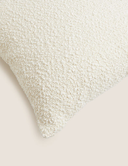 31e008dbe12c5b382177413cf064f4c41f5e829e342f34bc01a58d8f24b521ab.jpg An Image of M&S Bouclé Textured Cushion