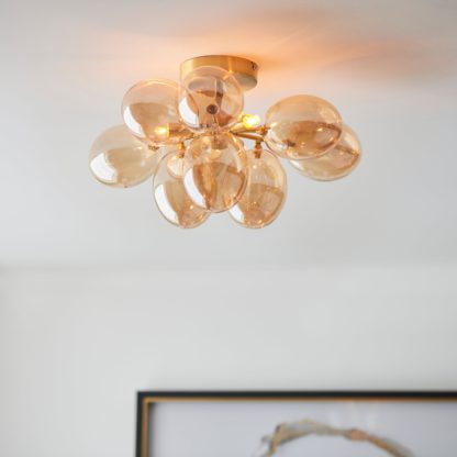 38405a549494f11f0240724926e9d678525a7e14ce4f8ac873ba4672bf40cba0.jpg An Image of Vogue Dianthe 3 Light Ceiling Fitting Champagne
