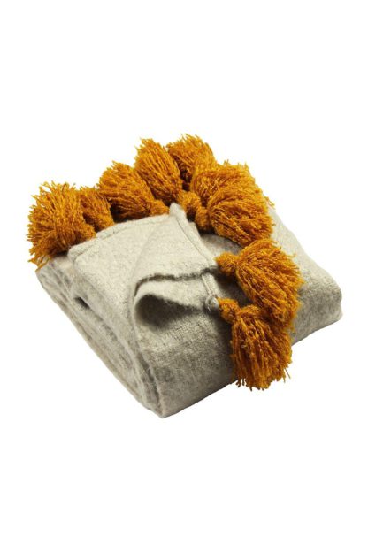 74e51ba0859bfd0ddc47df7b34cac422a345c89cbcd7154072c6b88abb8744b6.jpg An Image of 'Romily' Contrasting Tasselled Throw