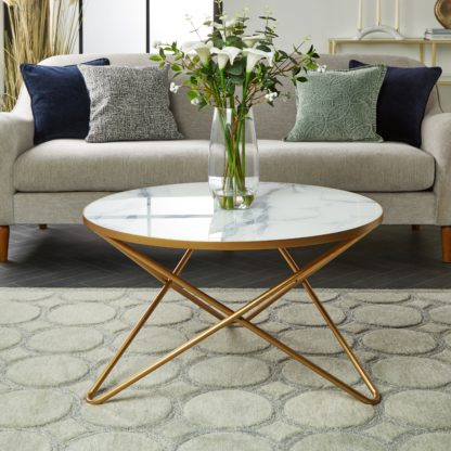 906bfb964eaed411387551651aebdb945319d7af4714b8d360f08a64fe0b7bf3.jpg An Image of Zoey White Marble Effect Coffee Table White