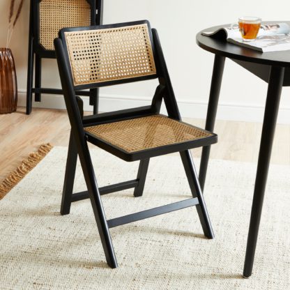 973130798216a58670023fede8adb4c3899dce3bb0a31123ca30a5682c5e6f32.jpg An Image of Franco Folding Dining Chair Black