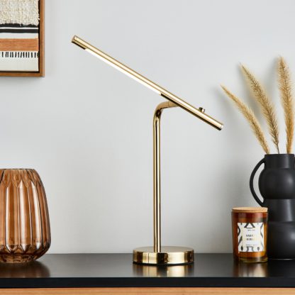 f1d70e71034a698d4836d577e24bfde4da95c93f5f220f78d7c6f8f4ce029c58.jpg An Image of Jackson Integrated LED Dimmable Table Lamp Gold