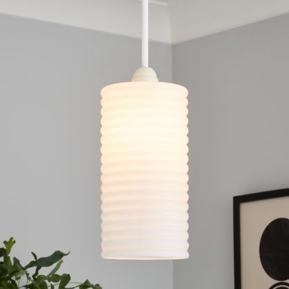 0ce887c1adee8ea8f636beb5831ab6e136a7207ea0e303e97d71846c6cf81f61.jpg An Image of Katya Ribbed Glass Easy Fit Shade - White